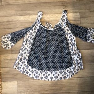Adorable blue and white cold shoulder top!